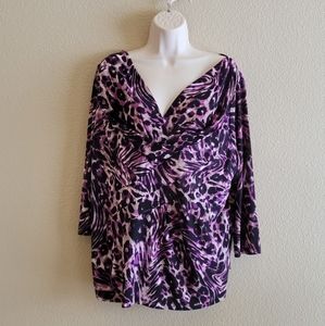 3/4 sleeve purple animal print top.